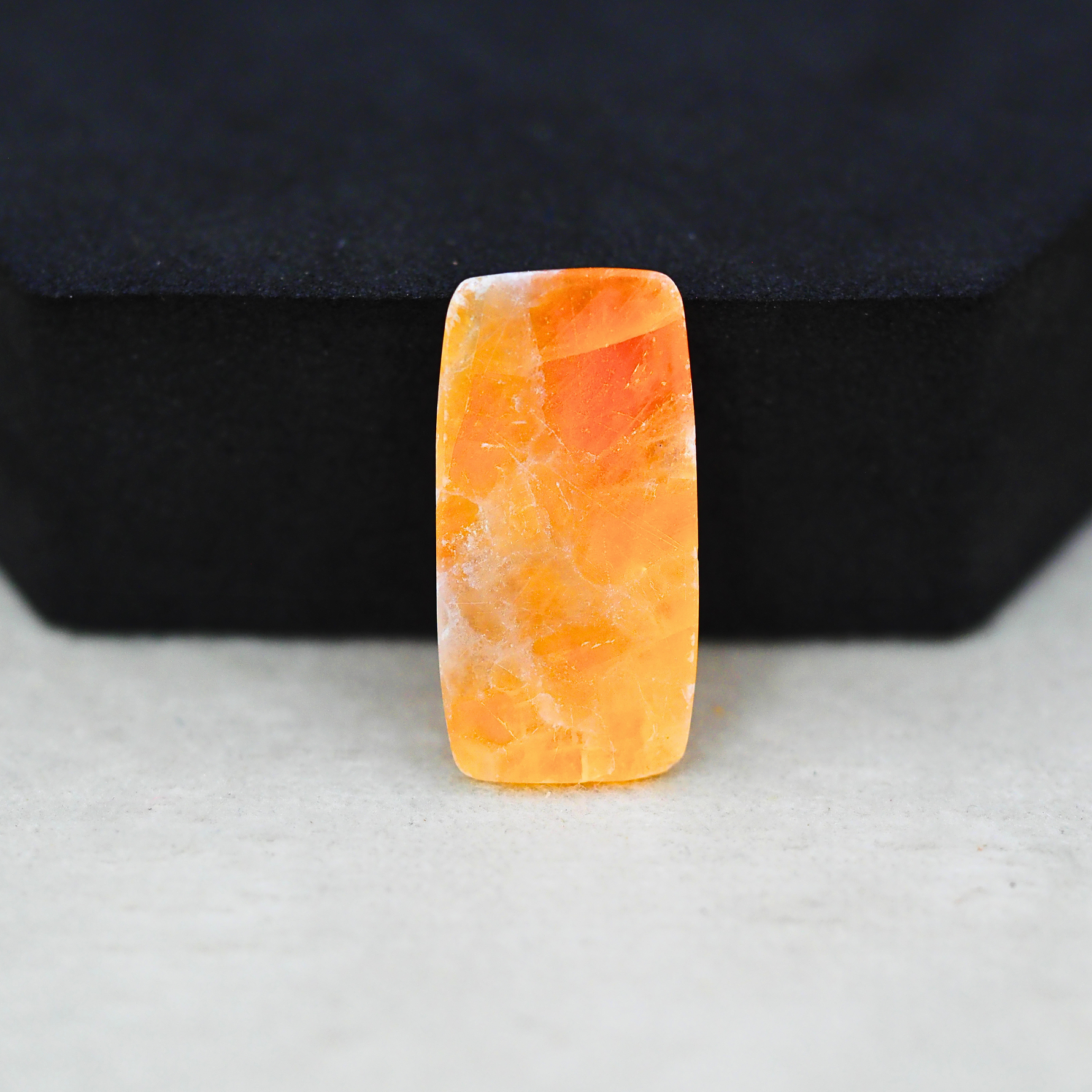 Natural Orange Calcite Baguette Cabochon 24x12mm 12.5ct - warm honey-orange - Pedra Gems.