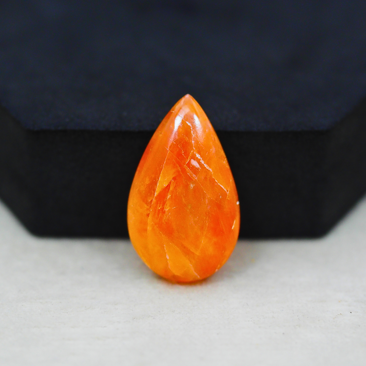 Natural Orange Calcite Pear Cabochon 28x17mm 22ct - warm honey-orange - Pedra Gems.