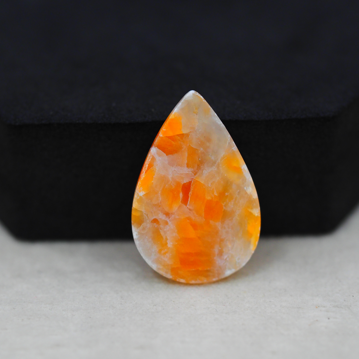 Natural Orange Calcite Pear Cabochon 27x18mm 22.5ct - warm honey-orange - Pedra Gems.