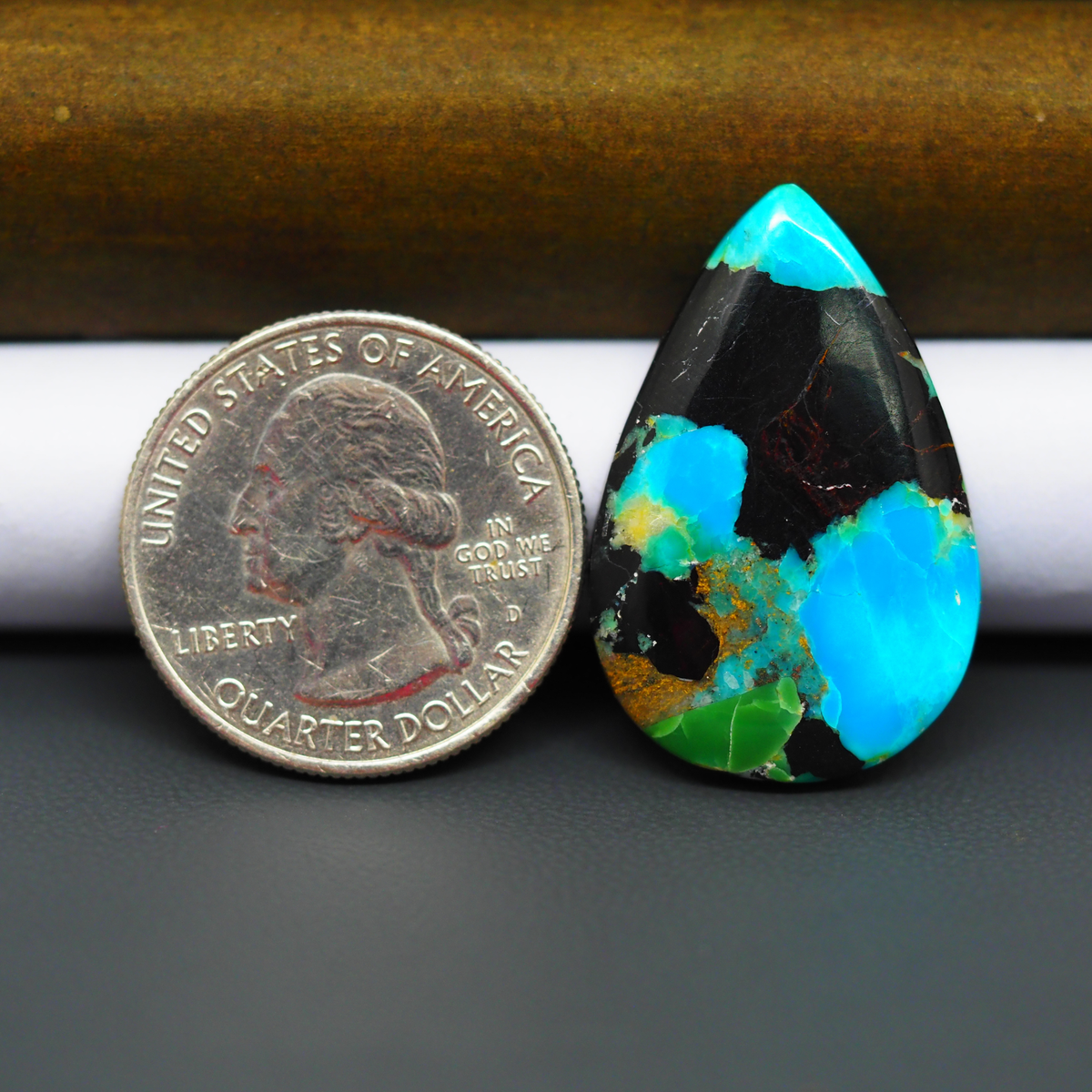 Mohave Turquoise & White Buffalo Pear Cabochon 31x20mm 18ct - Black with Bright Blue and Green - Pedra Gems