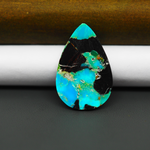 Mohave Turquoise & White Buffalo Pear Cabochon 31x20mm 18ct - Black with Bright Blue and Green - Pedra Gems