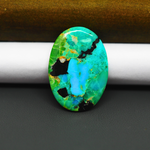 Mohave Turquoise & White Buffalo Oval Cabochon 29x21mm 18ct - Green and Blue with Black Fragments - Pedra Gems