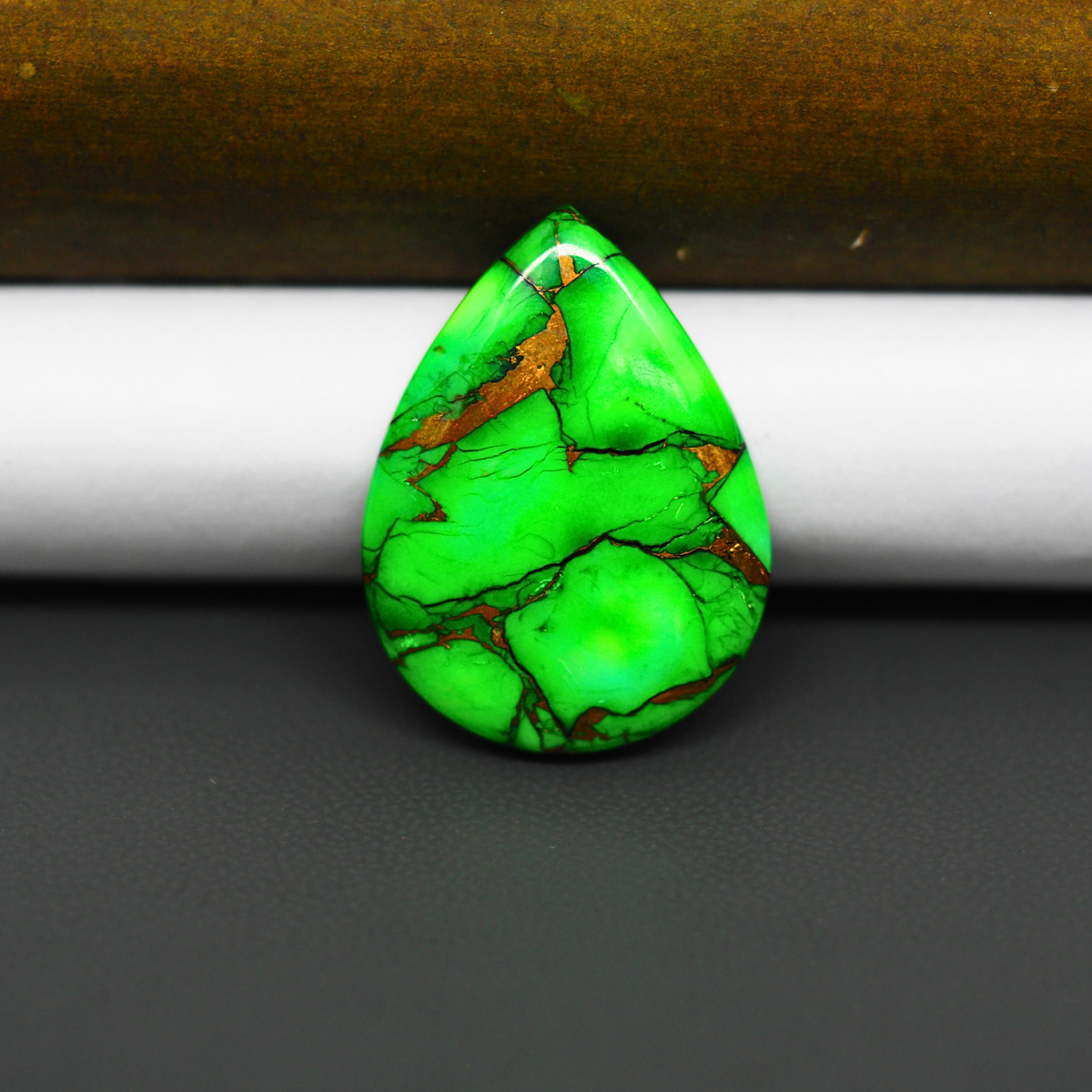 Natural Emerald Dahlia Pear Cabochon 26x19mm 20.5ct - vivid green with copper matrix, ships to Europe, Japan, Canada, Australia, NZ & worldwide - Pedra Gems.