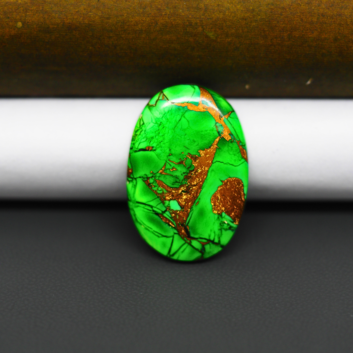 Natural Emerald Dahlia Oval Cabochon 25x17mm 14ct - vivid green with copper matrix, ships to Europe, Japan, Canada, Australia, NZ & worldwide - Pedra Gems.