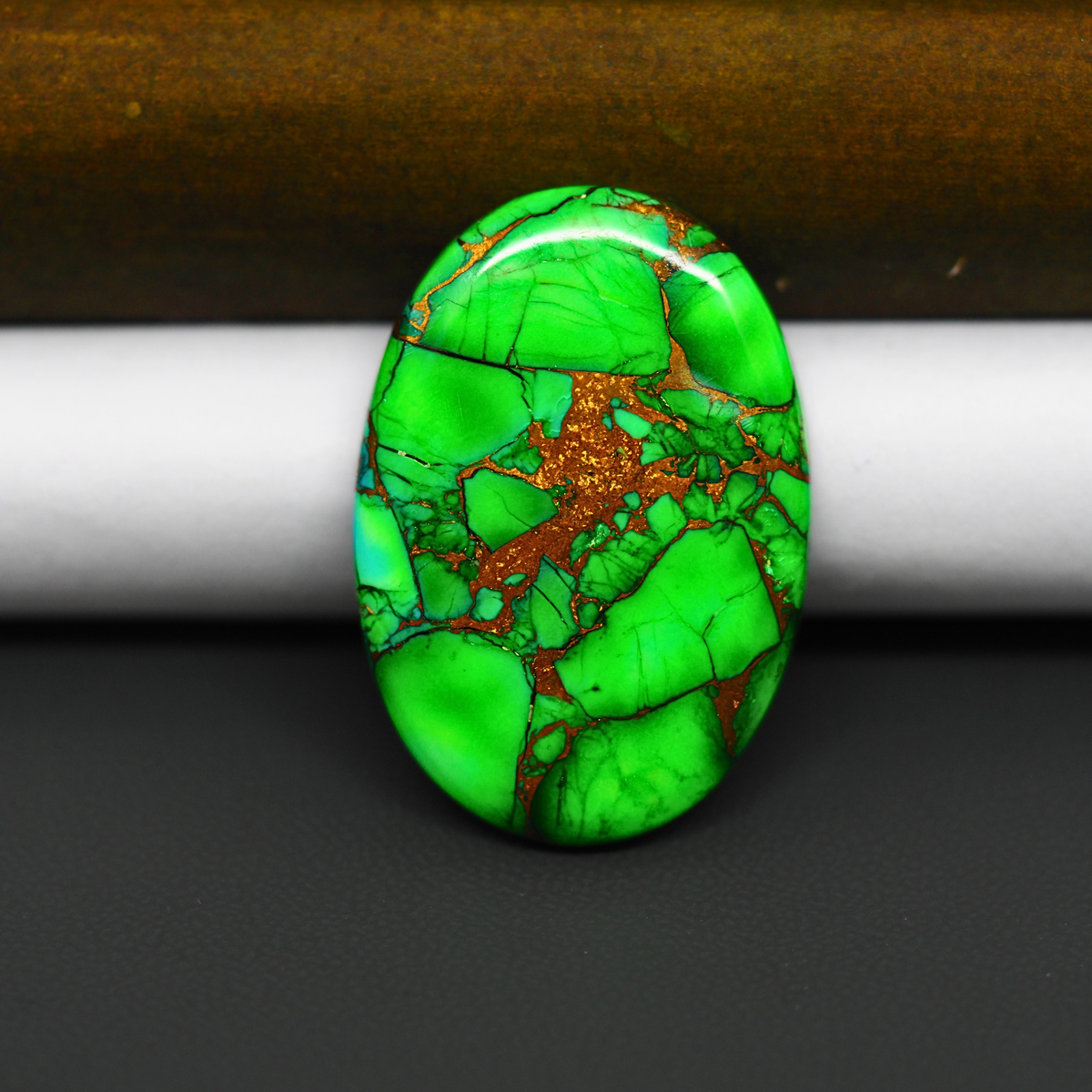 Natural Emerald Dahlia Oval Cabochon 33x22mm 28ct - vivid green with copper matrix, ships to Europe, Japan, Canada, Australia, NZ & worldwide - Pedra Gems.
