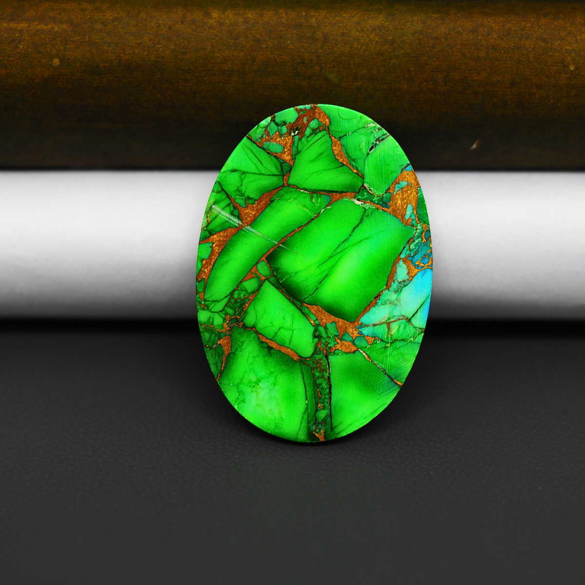 Natural Emerald Dahlia Oval Cabochon 33x22mm 28ct - vivid green with copper matrix, ships to Europe, Japan, Canada, Australia, NZ & worldwide - Pedra Gems.