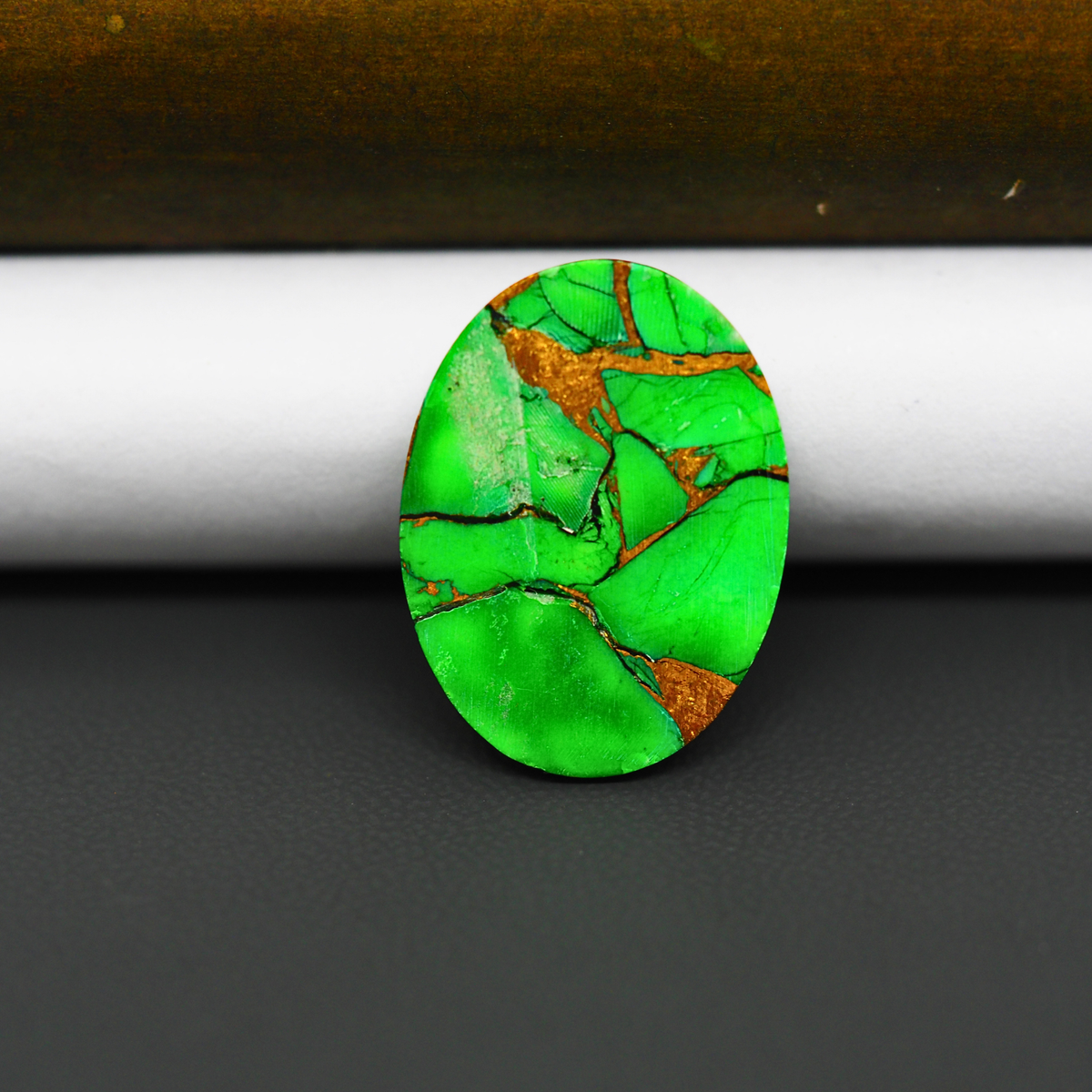 Natural Emerald Dahlia Oval Cabochon 24x18mm 15.5ct - vivid green with copper matrix, ships to Europe, Japan, Canada, Australia, NZ & worldwide - Pedra Gems.