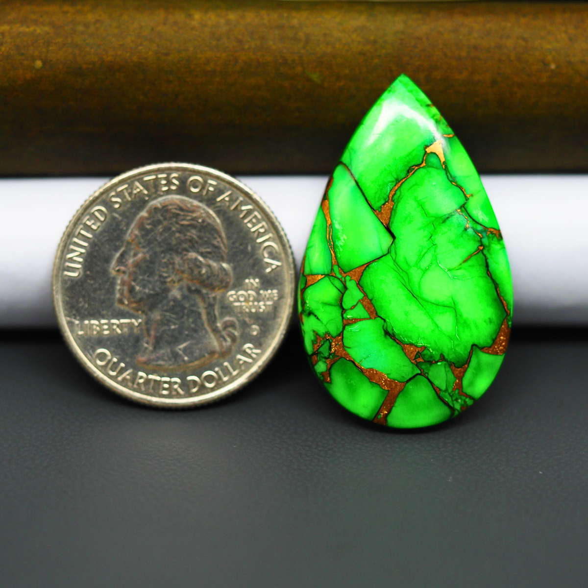 Natural Emerald Dahlia Pear Cabochon 35x21mm 22.5ct - vivid green with copper matrix, ships to Europe, Japan, Canada, Australia, NZ & worldwide - Pedra Gems.