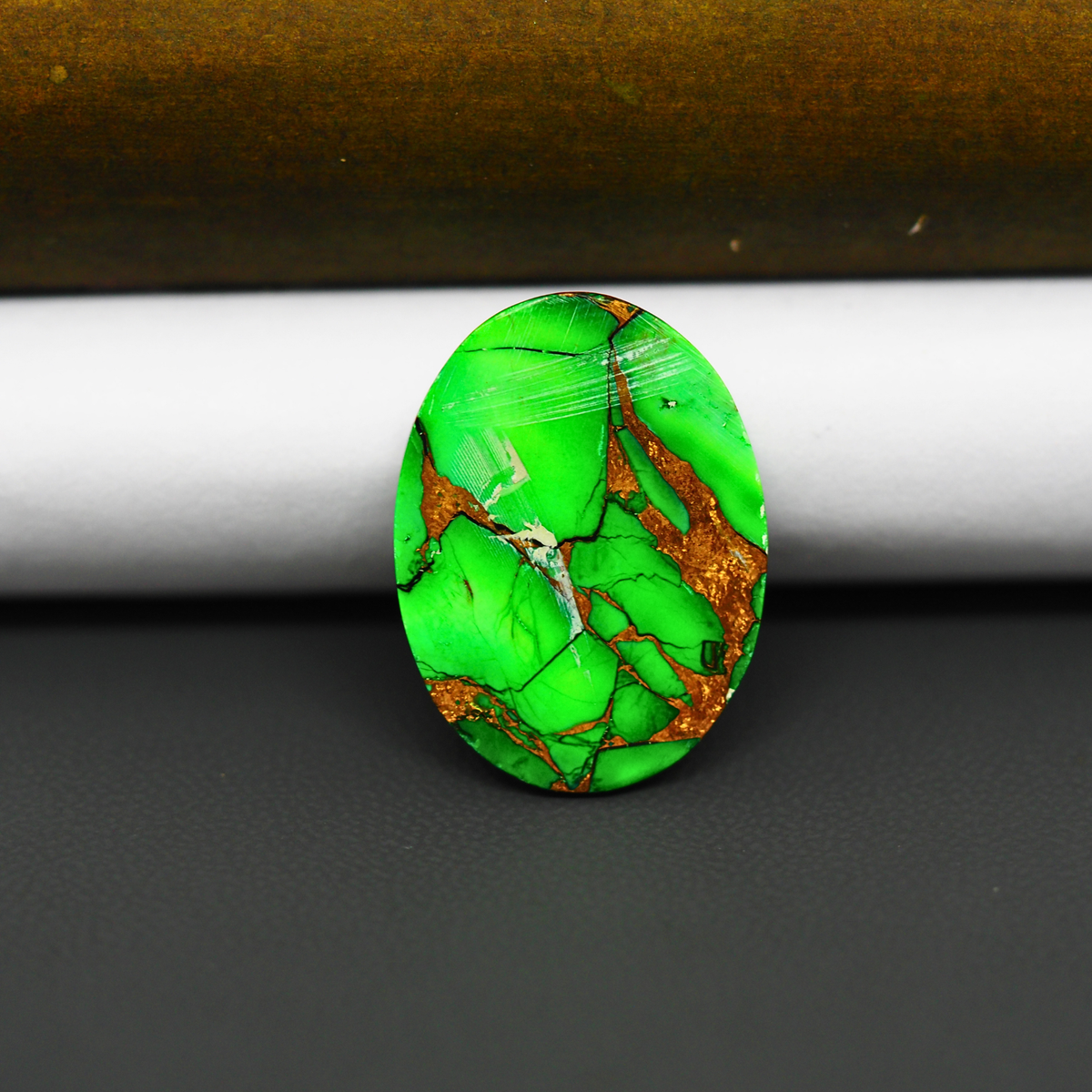 Natural Emerald Dahlia Oval Cabochon 24x16mm 15ct - vivid green with copper matrix, ships to Europe, Japan, Canada, Australia, NZ & worldwide - Pedra Gems.