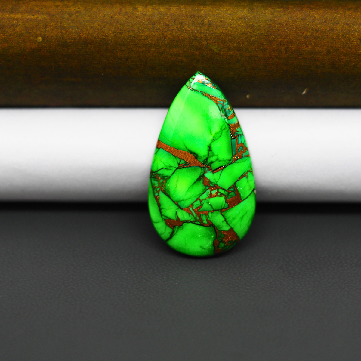 Natural Emerald Dahlia Pear Cabochon 19x17mm 16ct - vivid green with copper matrix, ships to Europe & worldwide - Pedra Gems.