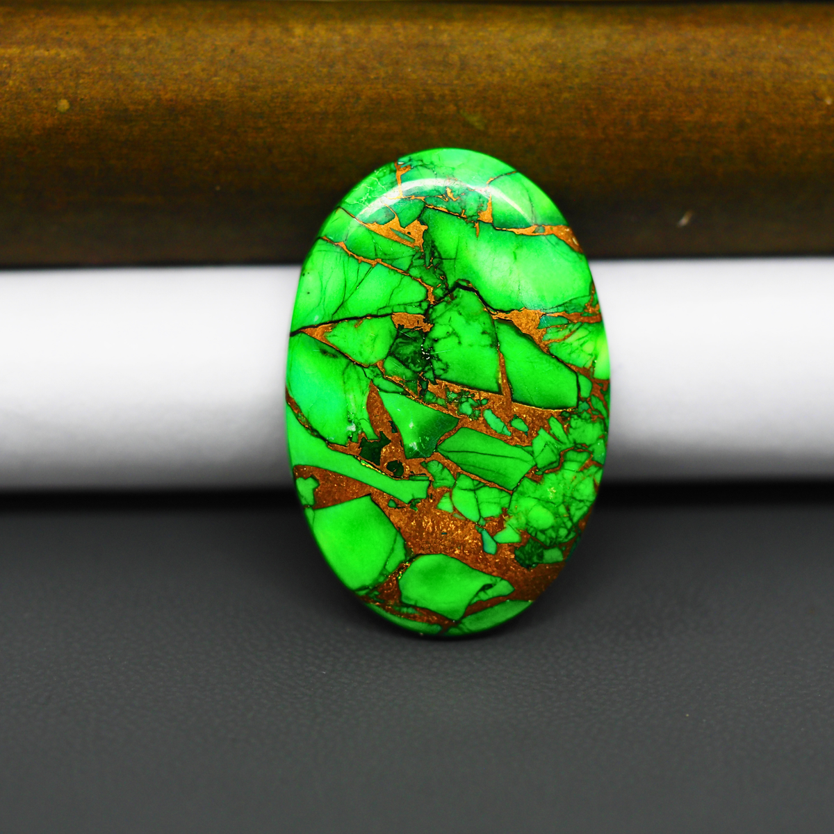 Natural Emerald Dahlia Oval Cabochon 32x22mm 24.5ct - vivid green with copper matrix - Pedra Gems.