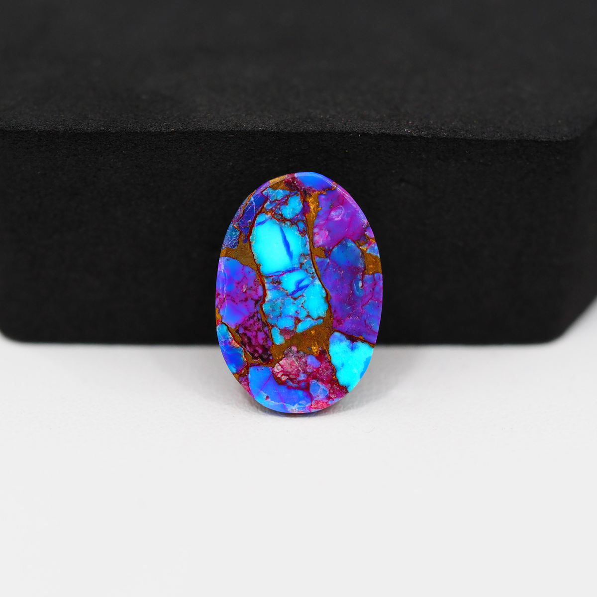 Stabilized Purple Mohave (Mojave) Turquoise Oval Cabochon 19x13x5mm 10.5ct - purple with blue Kingman turquoise nuggets and bronze veining - Pedra Gems.