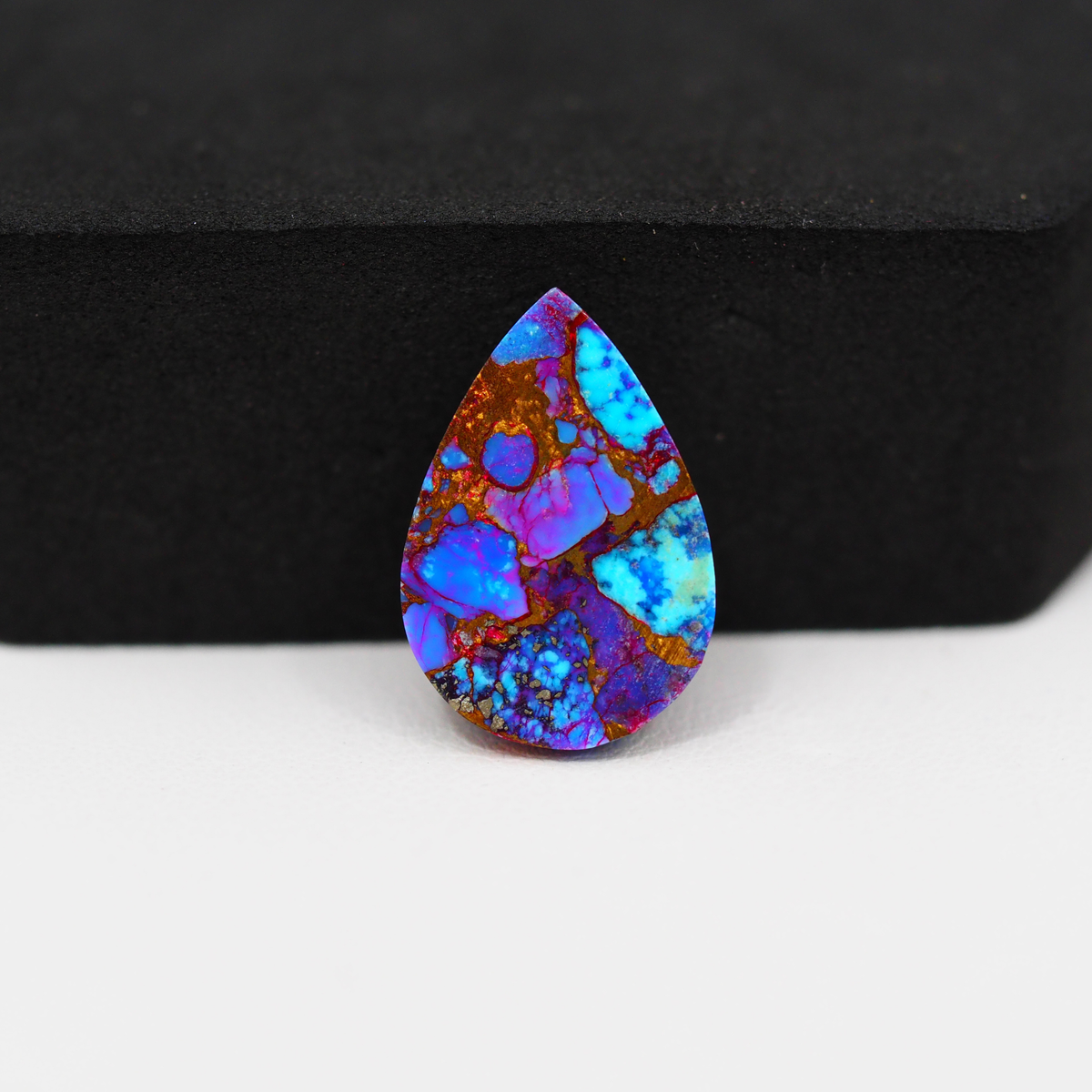 Stabilized Purple Mohave (Mojave) Turquoise Pear Cabochon 19x13x4mm 9ct - purple with blue Kingman turquoise nuggets and bronze veining - Pedra Gems.