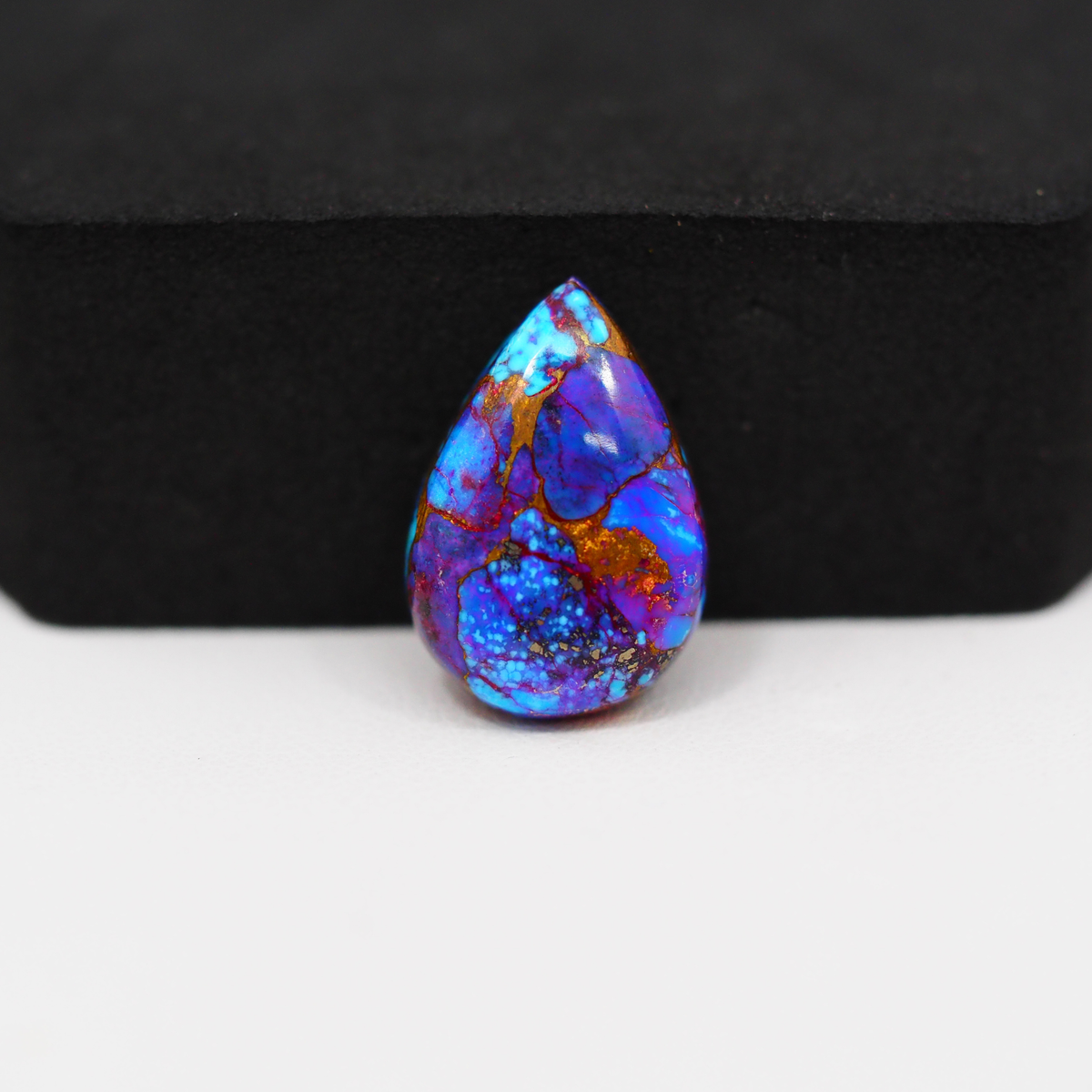 Stabilized Purple Mohave (Mojave) Turquoise Pear Cabochon 19x13x4mm 9ct - purple with blue Kingman turquoise nuggets and bronze veining - Pedra Gems.