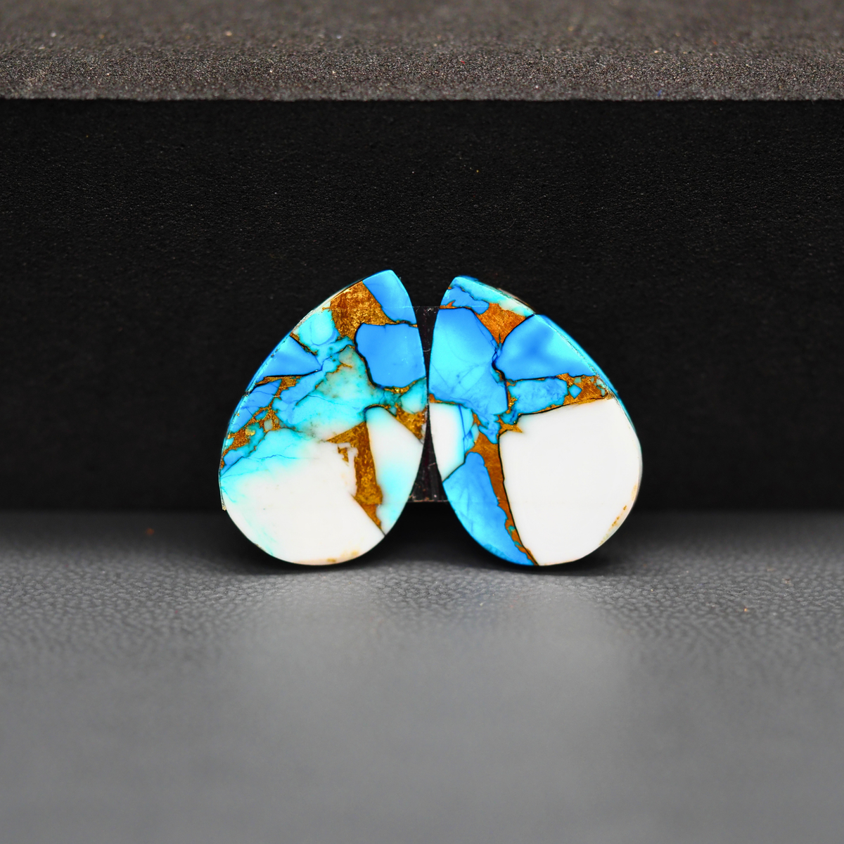 Kingman Ice Blue Dahlia Composite Pear Cabochon Pair 19x12x3mm 15ct - icy blue and white stone with copper veining - Pedra Gems