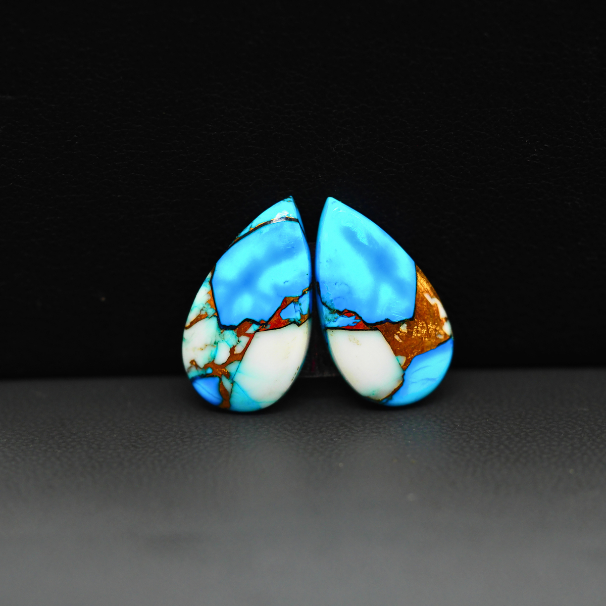 Kingman Ice Blue Dahlia Composite Pear Cabochon Pair 19x11x3mm 13ct - icy blue and white stone with copper veining - Pedra Gems