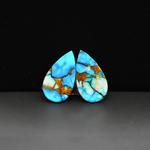Kingman Ice Blue Dahlia Composite Pear Cabochon Pair 19x11x3mm 13ct - icy blue and white stone with copper veining - Pedra Gems
