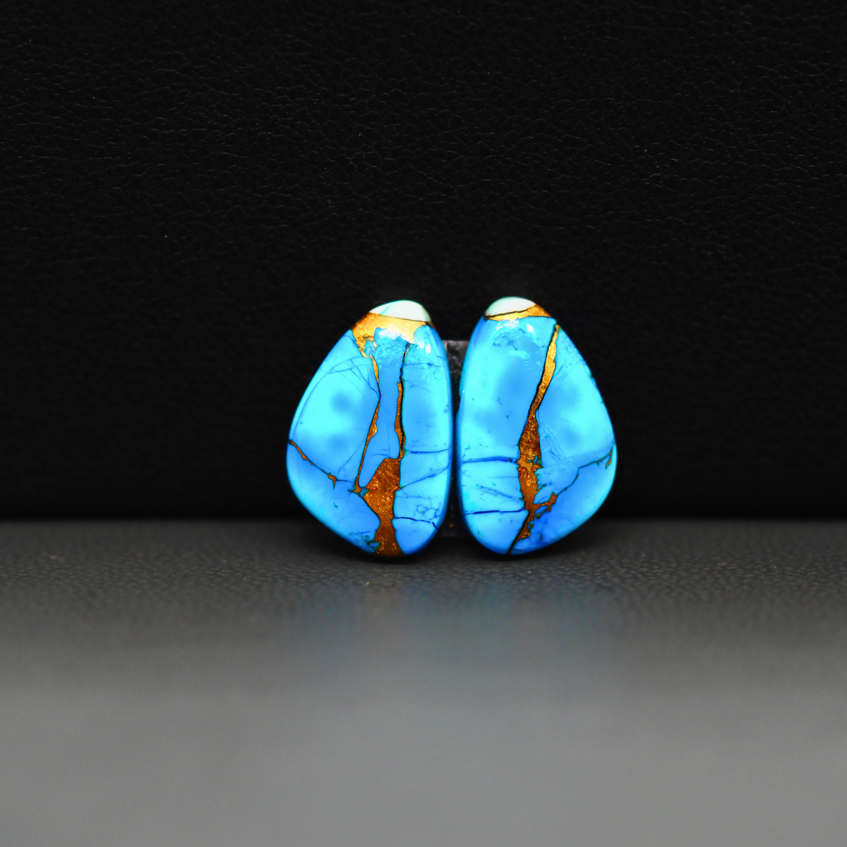 Kingman Ice Blue Dahlia Composite Freeform Cabochon Pair 15x9x3mm 8ct - icy blue and white stone with copper veining - Pedra Gems