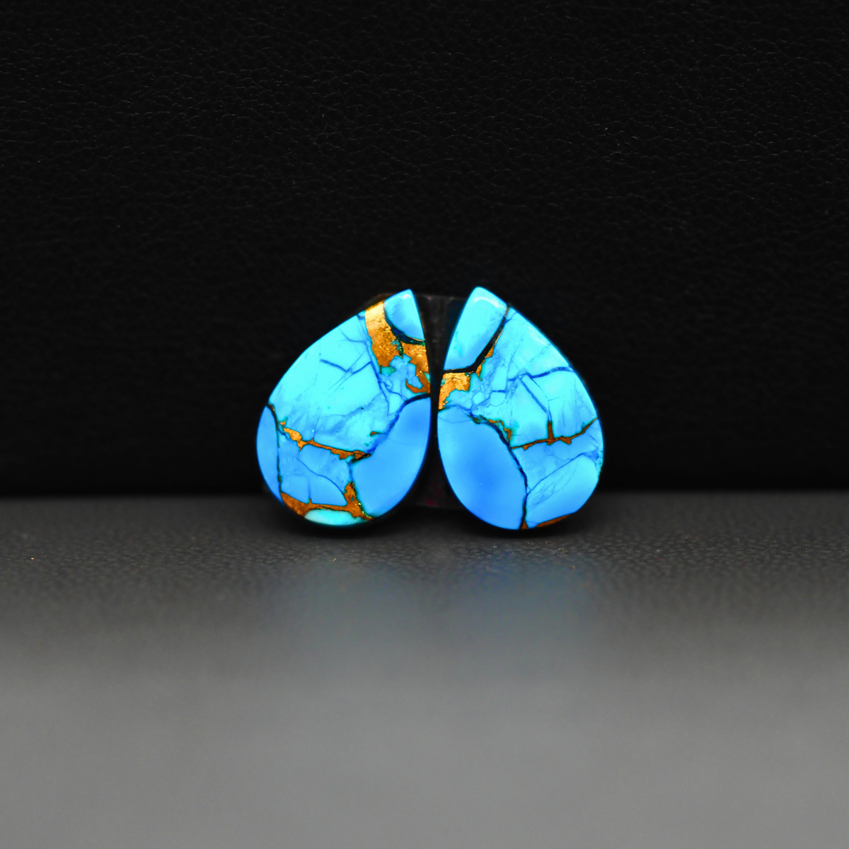 Kingman Ice Blue Dahlia Composite Pear Cabochon Pair 14x10x3mm 8.5ct - icy blue and white stone with copper veining - Pedra Gems