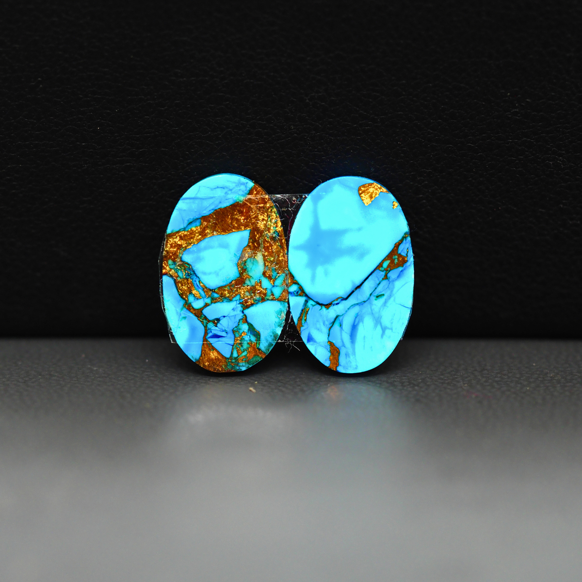 Kingman Ice Blue Dahlia Composite Oval Cabochon Pair 16x11x3mm 12ct - icy blue and white stone with copper veining - Pedra Gems