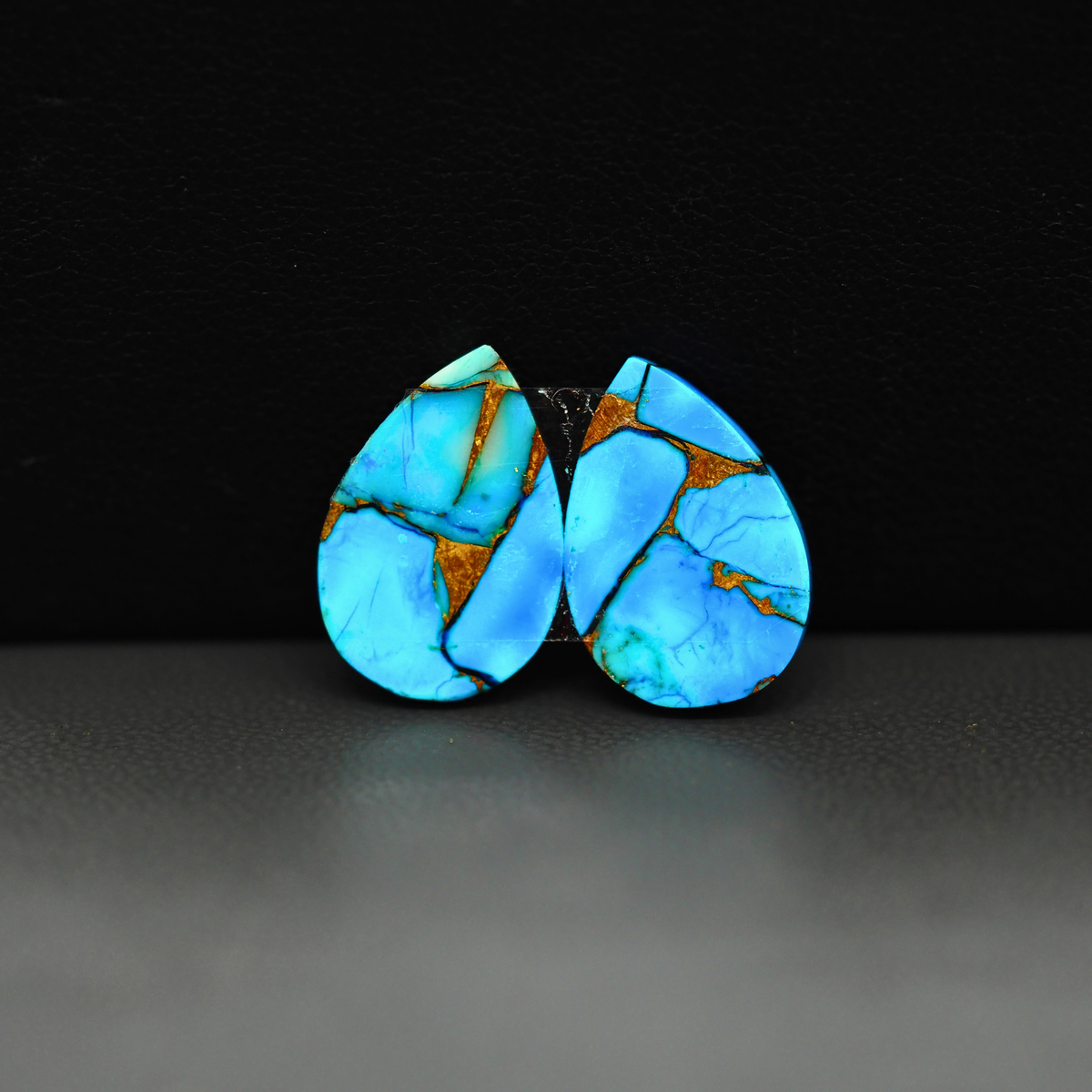 Kingman Ice Blue Dahlia Composite Pear Cabochon Pair 17x11x3mm 12ct - icy blue and white stone with copper veining - Pedra Gems