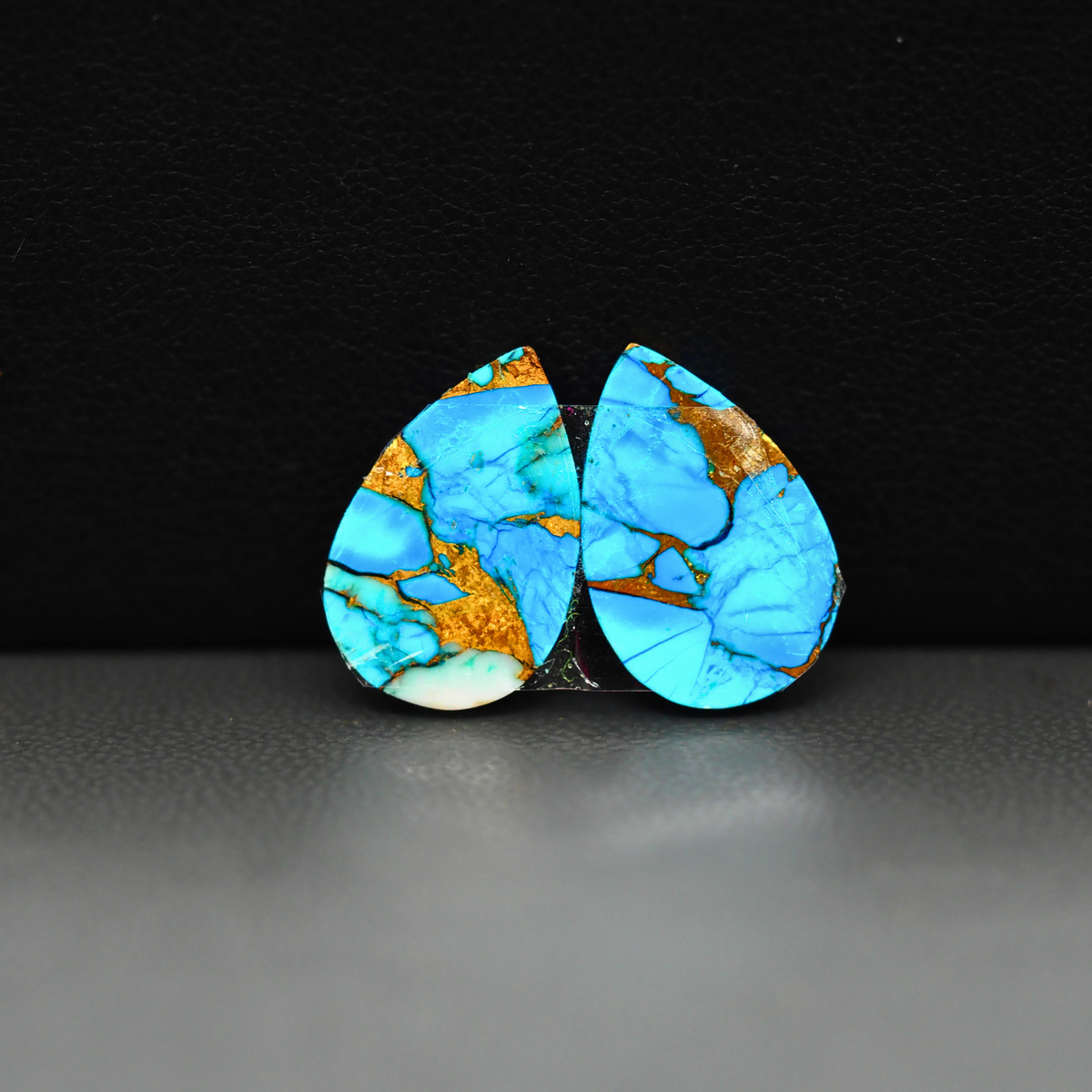 Kingman Ice Blue Dahlia Composite Pear Cabochon Pair 14x10x3mm 10ct - icy blue and white stone with copper veining - Pedra Gems