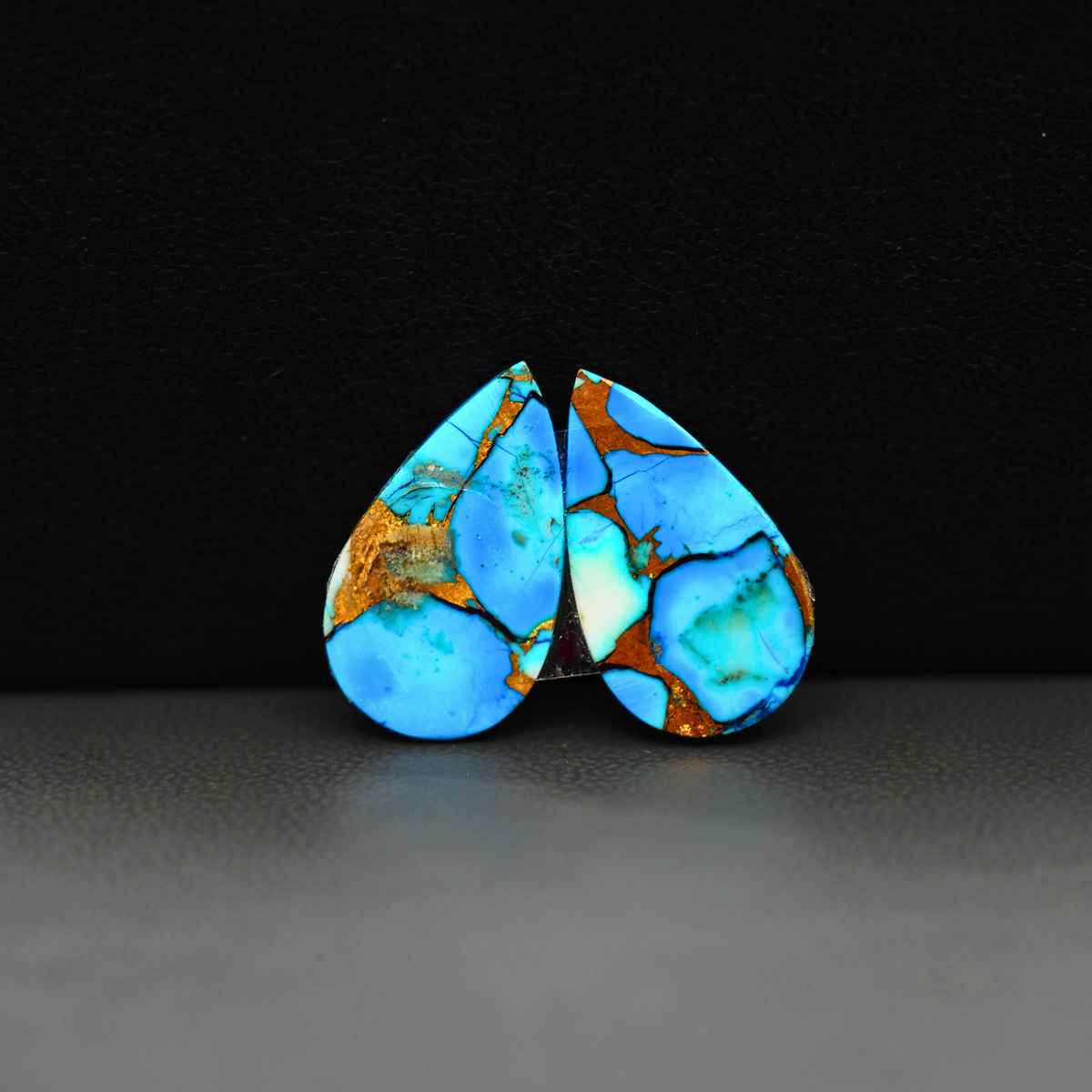 Kingman Ice Blue Dahlia Composite Pear Cabochon Pair 19x11x3mm 12ct - icy blue and white stone with copper veining - Pedra Gems