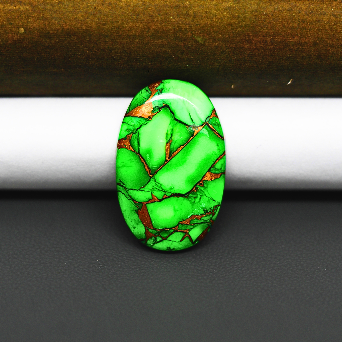 Natural Emerald Dahlia Oval Cabochon 26x17mm 17ct - vivid green with copper matrix, ships to Europe, Japan, Canada, Australia, NZ & worldwide - Pedra Gems.