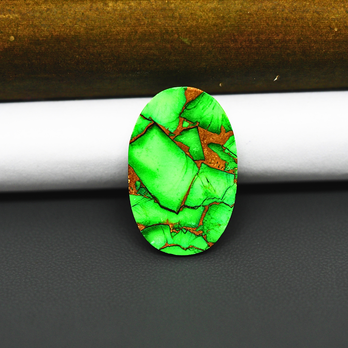 Natural Emerald Dahlia Oval Cabochon 26x17mm 17ct - vivid green with copper matrix, ships to Europe, Japan, Canada, Australia, NZ & worldwide - Pedra Gems.