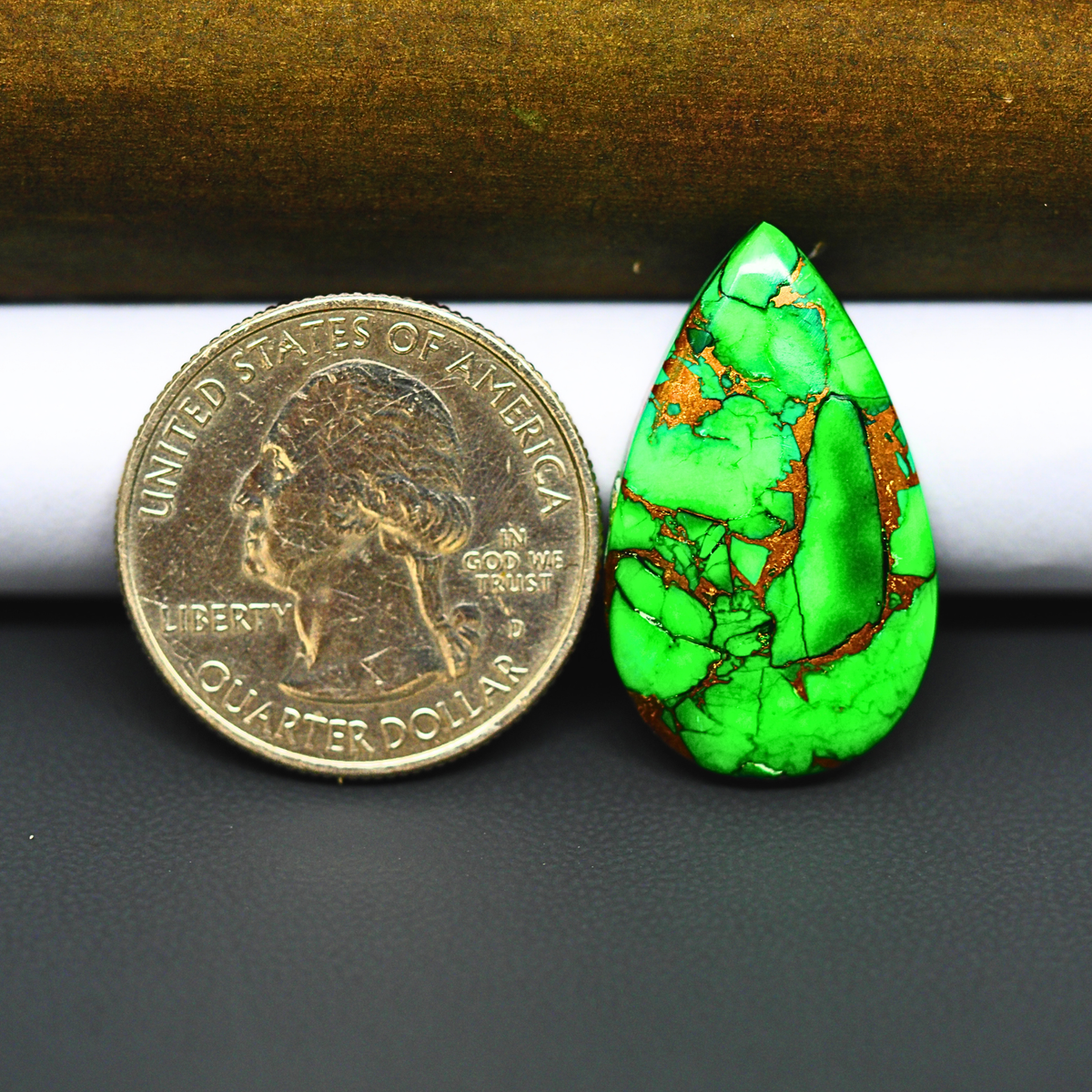 Natural Emerald Dahlia Pear Cabochon 27x16mm 16ct - vivid green with copper matrix, ships to Europe, Japan, Canada, Australia, NZ & worldwide - Pedra Gems.