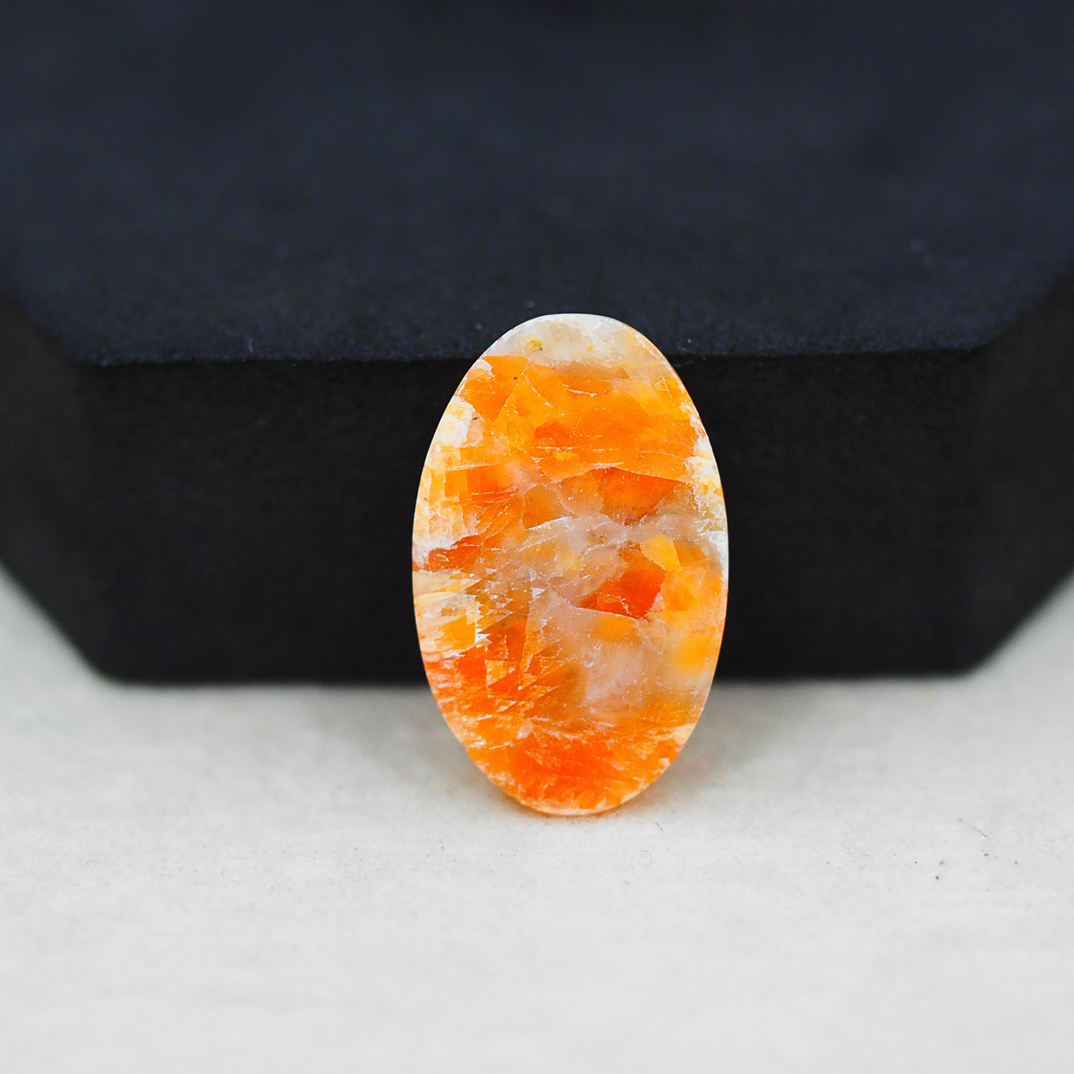 Natural Orange Calcite Oval Cabochon 25x16mm 16.5ct - warm honey-orange - Pedra Gems.