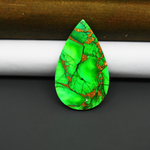 Natural Emerald Dahlia Pear Cabochon 35x21mm 23.5ct - vivid green with copper matrix, ships to Europe, Japan, Canada, Australia, NZ & worldwide - Pedra Gems.