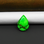 Natural Emerald Dahlia Pear Cabochon 19x14mm 8.5ct - vivid green with copper matrix, ships to Europe, Japan, Canada, Australia, NZ & worldwide - Pedra Gems.