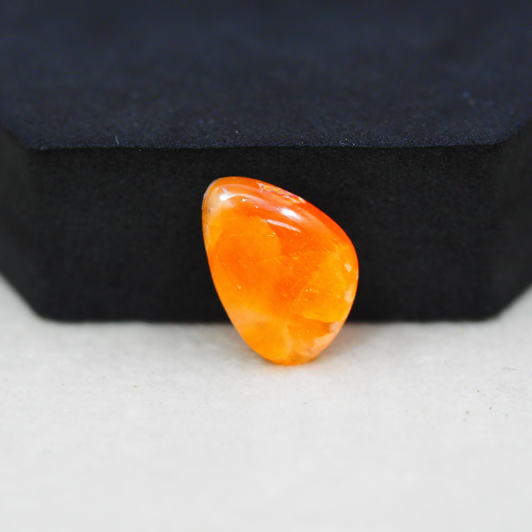 Natural Orange Calcite Trillion Cabochon 20x14mm 10ct - warm honey-orange - Pedra Gems.