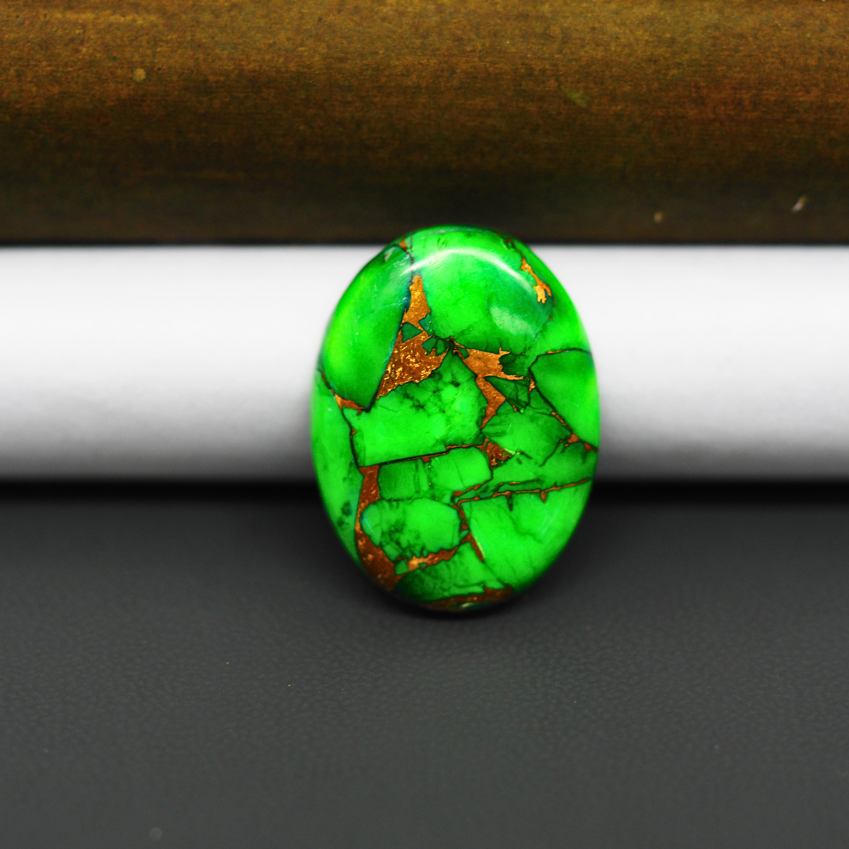 Natural Emerald Dahlia Oval Cabochon 24x18mm 17ct - vivid green with copper matrix, ships to Europe, Japan, Canada, Australia, NZ & worldwide - Pedra Gems.