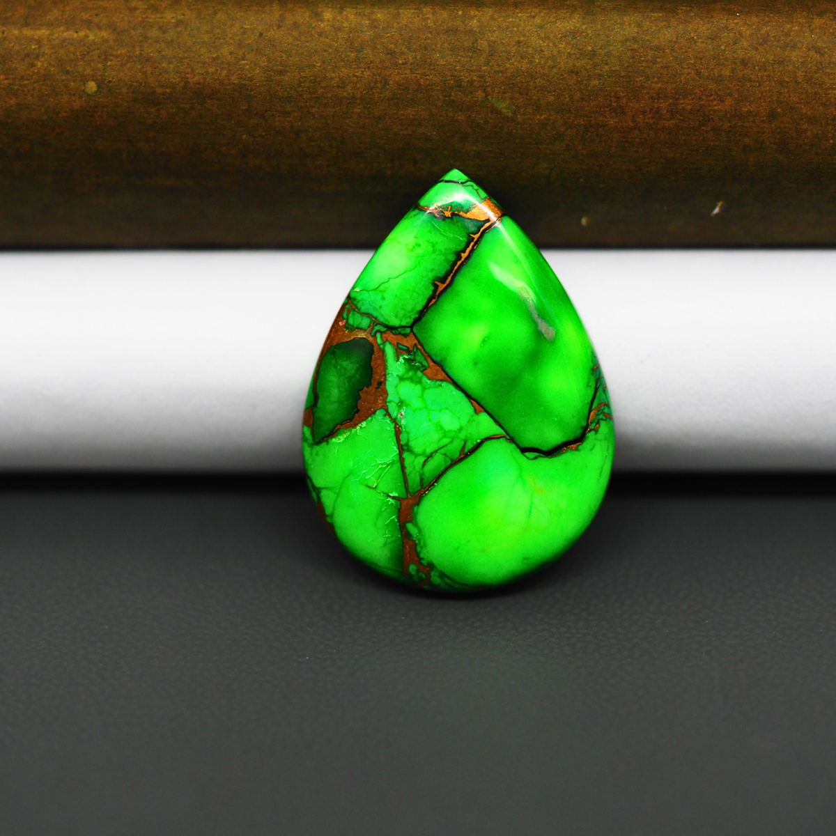Natural Emerald Dahlia Pear Cabochon 28x20mm 20.5ct - vivid green with copper matrix, ships to Europe, Japan, Canada, Australia, NZ & worldwide - Pedra Gems.