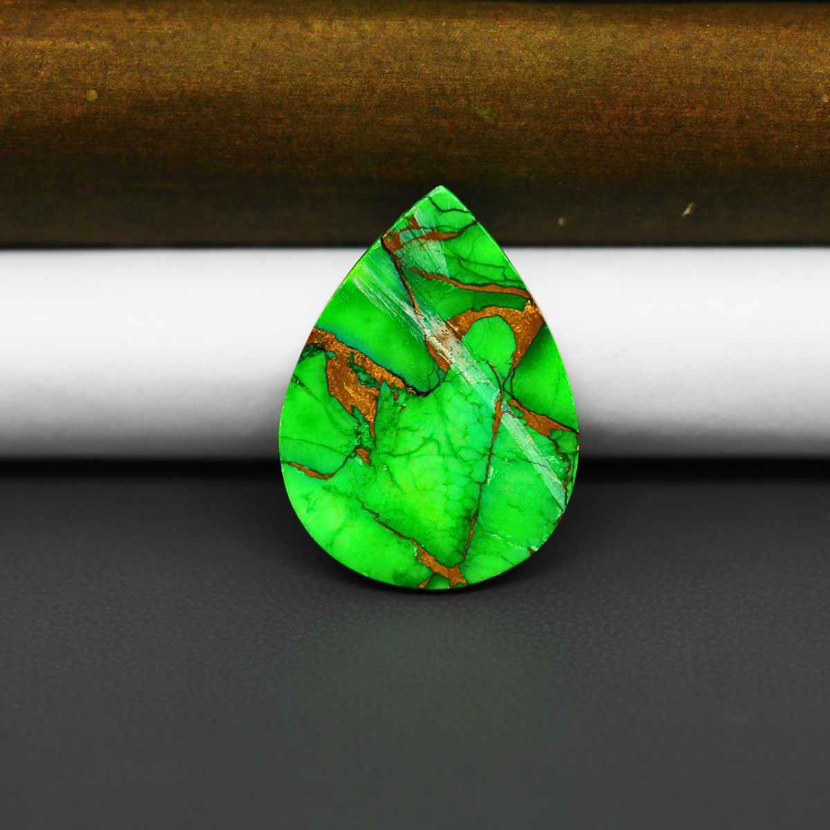 Natural Emerald Dahlia Pear Cabochon 28x20mm 20.5ct - vivid green with copper matrix, ships to Europe, Japan, Canada, Australia, NZ & worldwide - Pedra Gems.