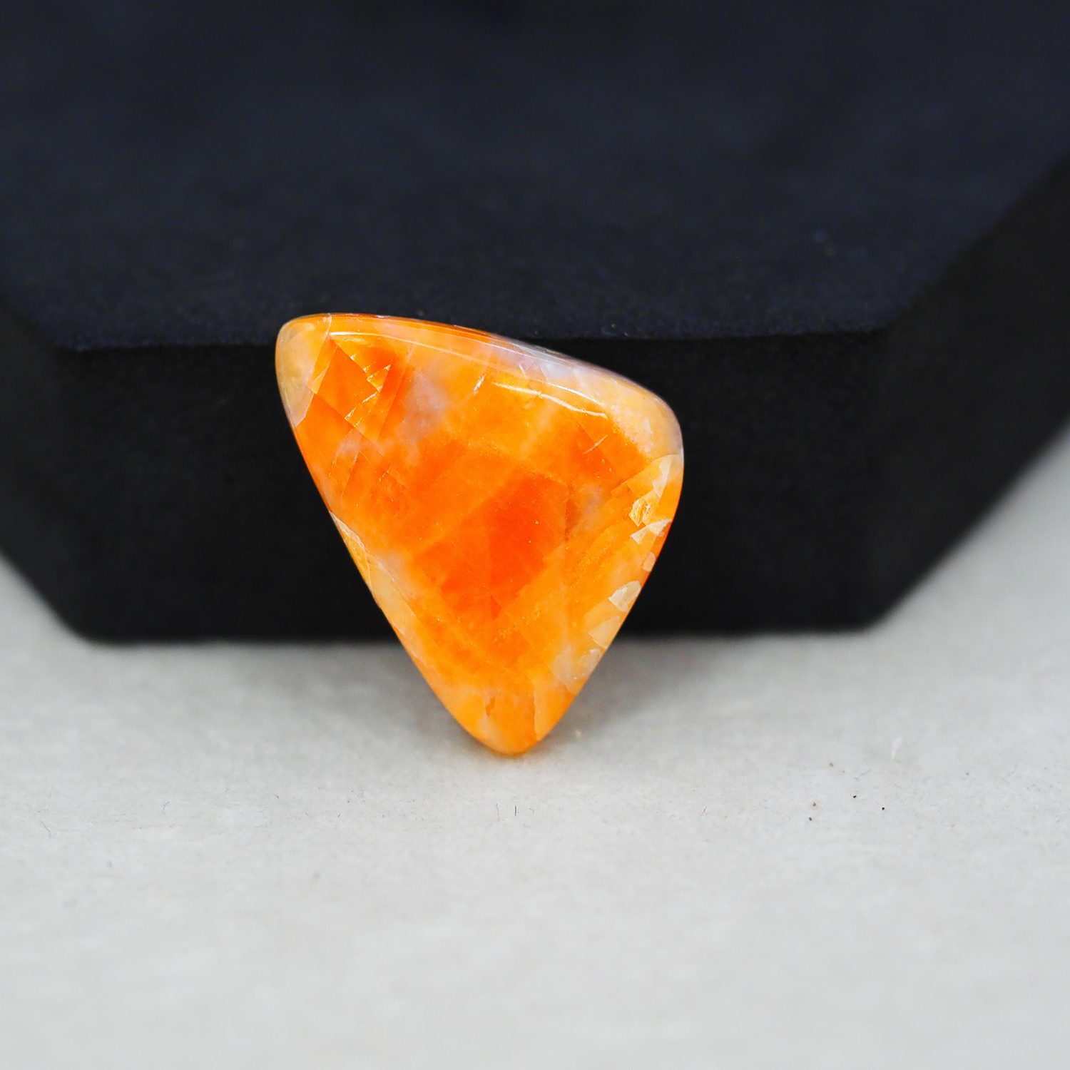 Natural Orange Calcite Trillion Cabochon 27x19mm 20.5ct - warm honey-orange - Pedra Gems.