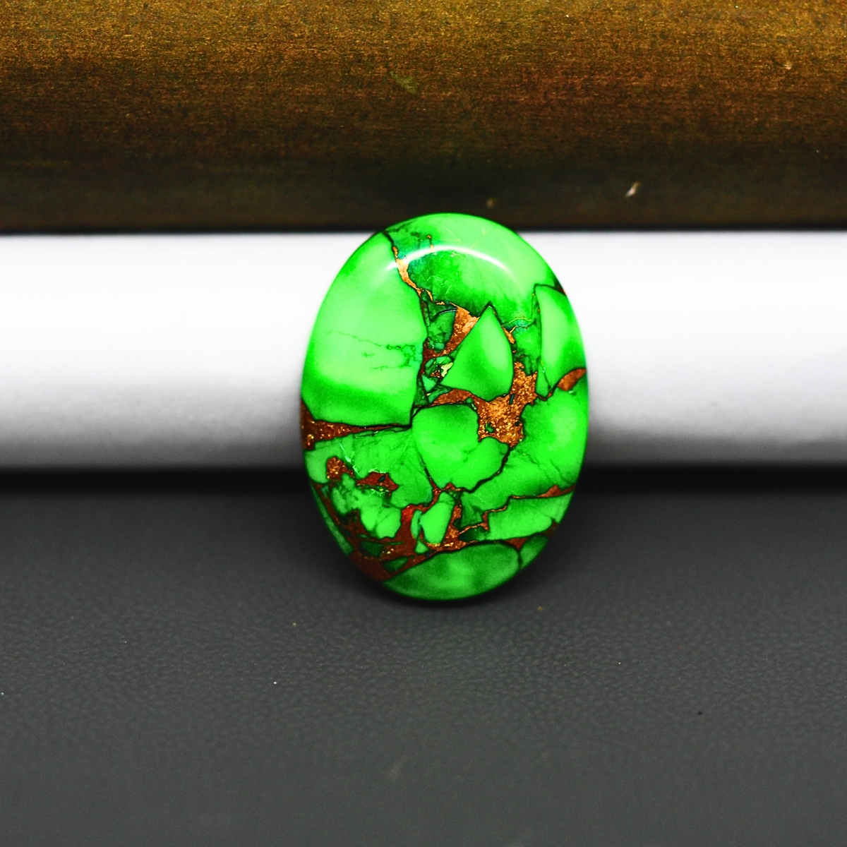 Natural Emerald Dahlia Oval Cabochon 24x18mm 16.5ct - vivid green with copper matrix, ships to Europe, Japan, Canada, Australia, NZ & worldwide - Pedra Gems.
