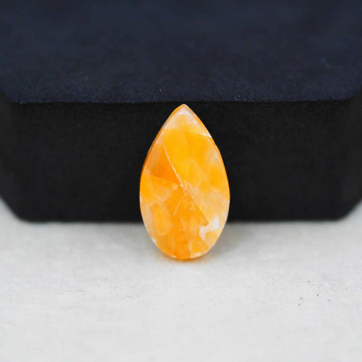 Natural Orange Calcite Pear Cabochon 21x12mm 10ct - warm honey-orange - Pedra Gems.