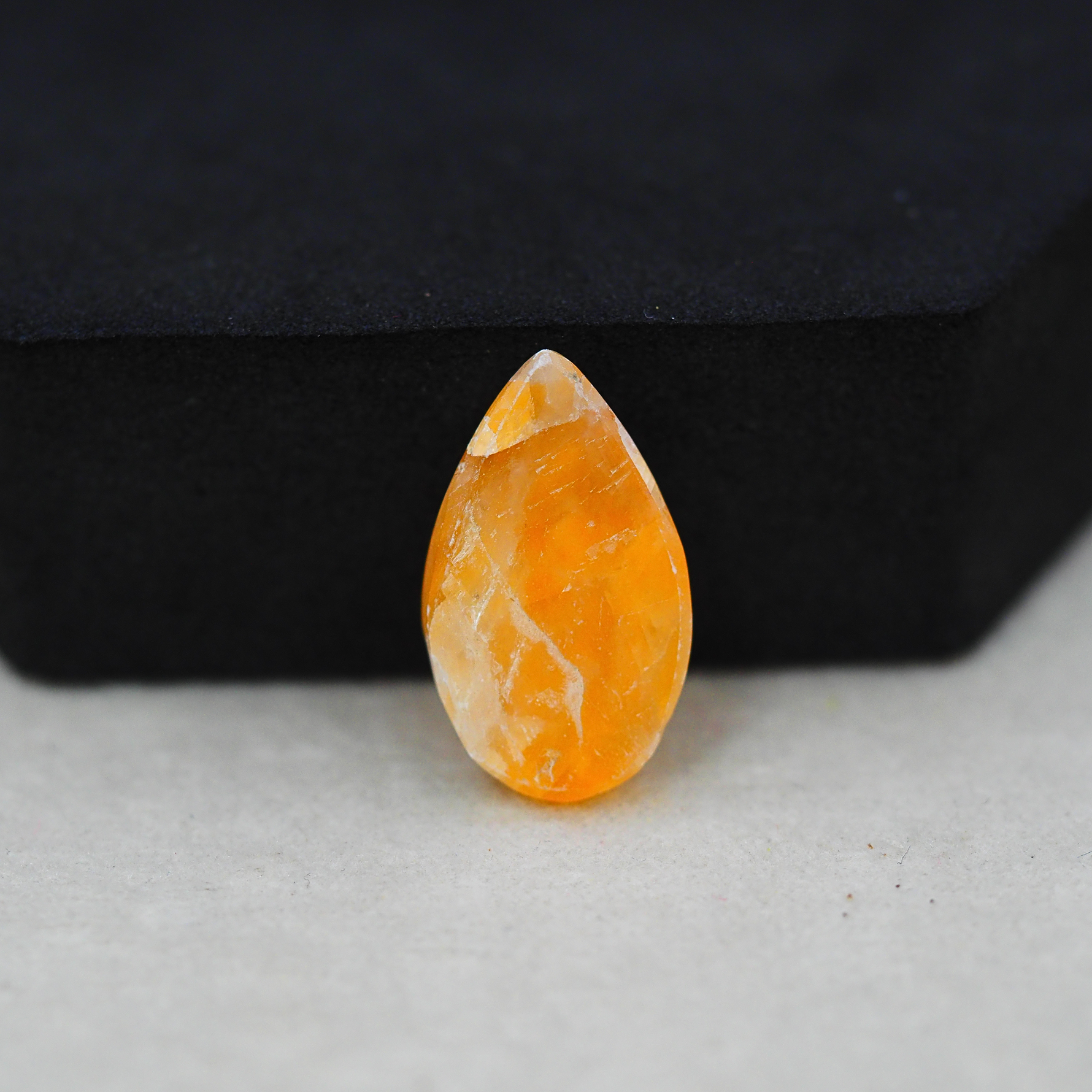 Natural Orange Calcite Pear Cabochon 21x12mm 10ct - warm honey-orange - Pedra Gems.