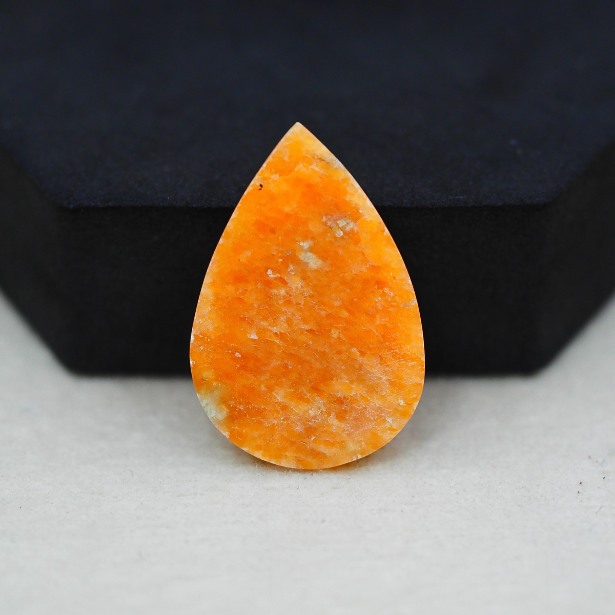Natural Orange Calcite Pear Cabochon 32x21mm 25ct - warm honey-orange - Pedra Gems.