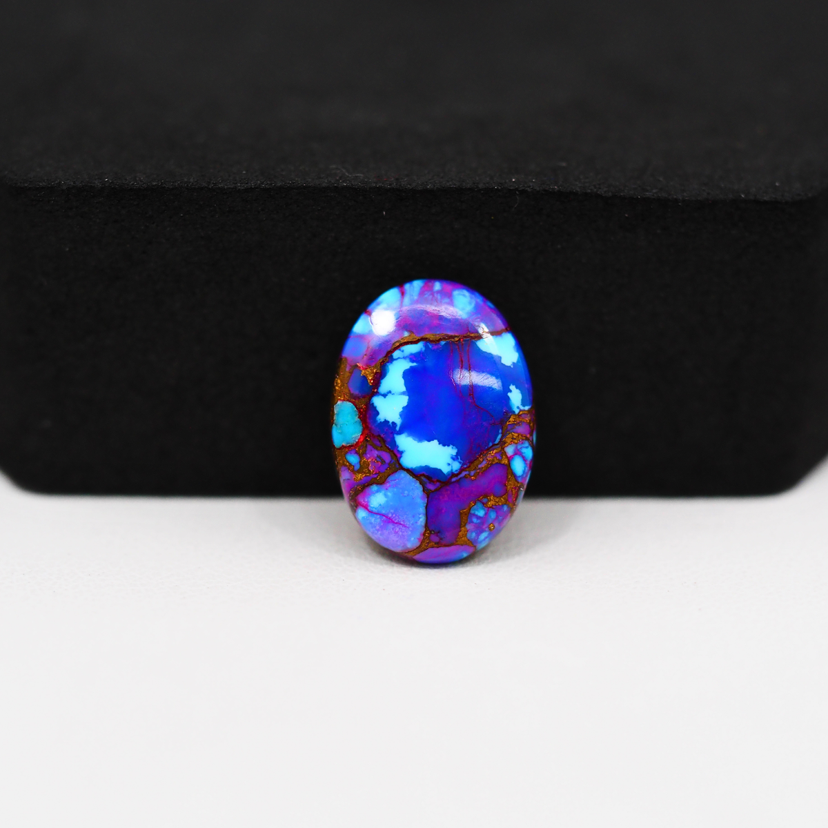 Stabilized Purple Mohave (Mojave) Turquoise Oval Cabochon 16x12x3mm 5.5ct - purple with blue Kingman turquoise nuggets and bronze veining - Pedra Gems.