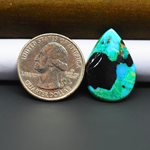 Mohave Turquoise & White Buffalo Pear Cabochon 26x18mm 11ct - Black Panel with Blue and Green - Pedra Gems