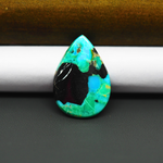 Mohave Turquoise & White Buffalo Pear Cabochon 26x18mm 11ct - Black Panel with Blue and Green - Pedra Gems