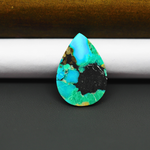 Mohave Turquoise & White Buffalo Pear Cabochon 26x18mm 11ct - Black Panel with Blue and Green - Pedra Gems