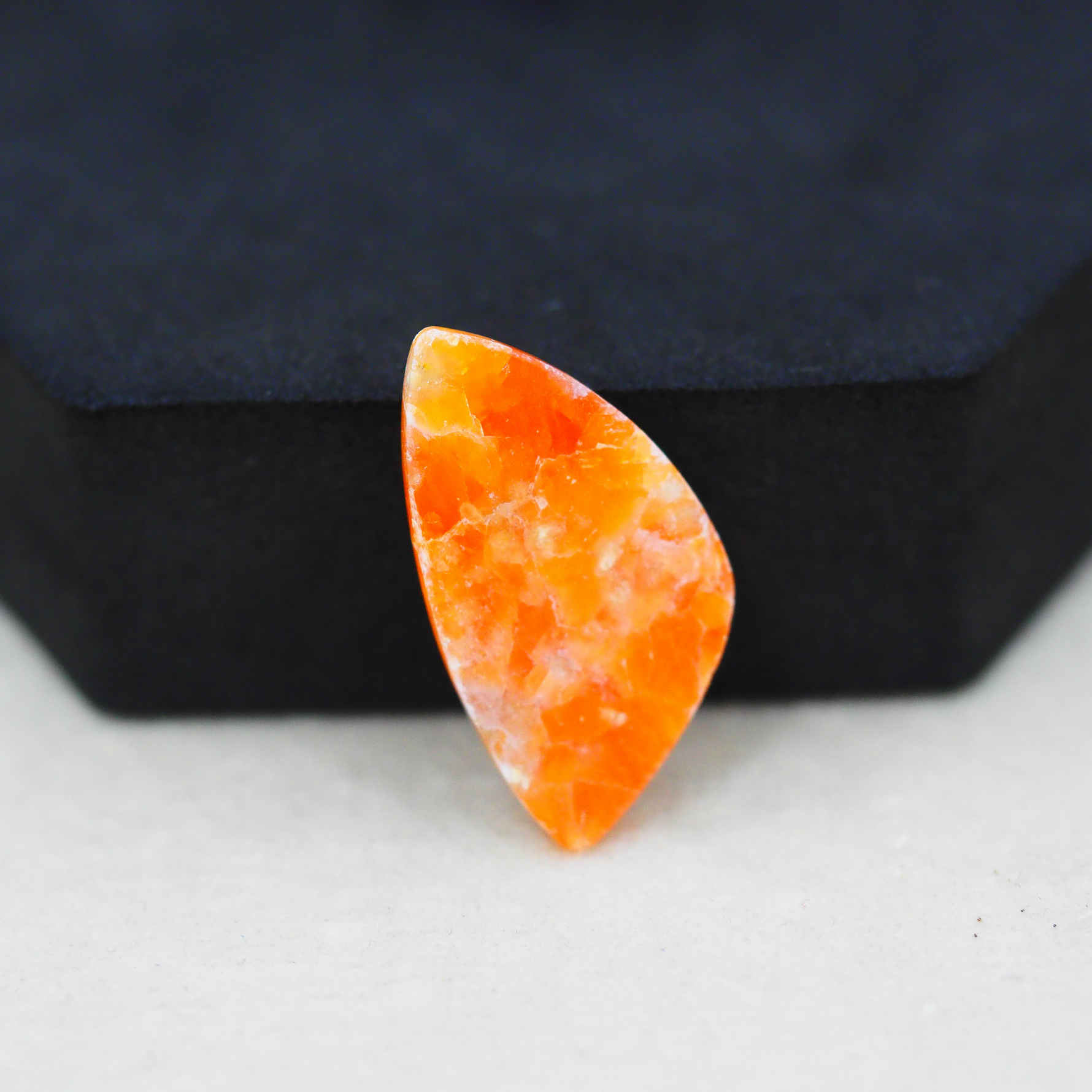 Natural Orange Calcite Trillion Cabochon 28x15mm 13.5ct - warm honey-orange - Pedra Gems.