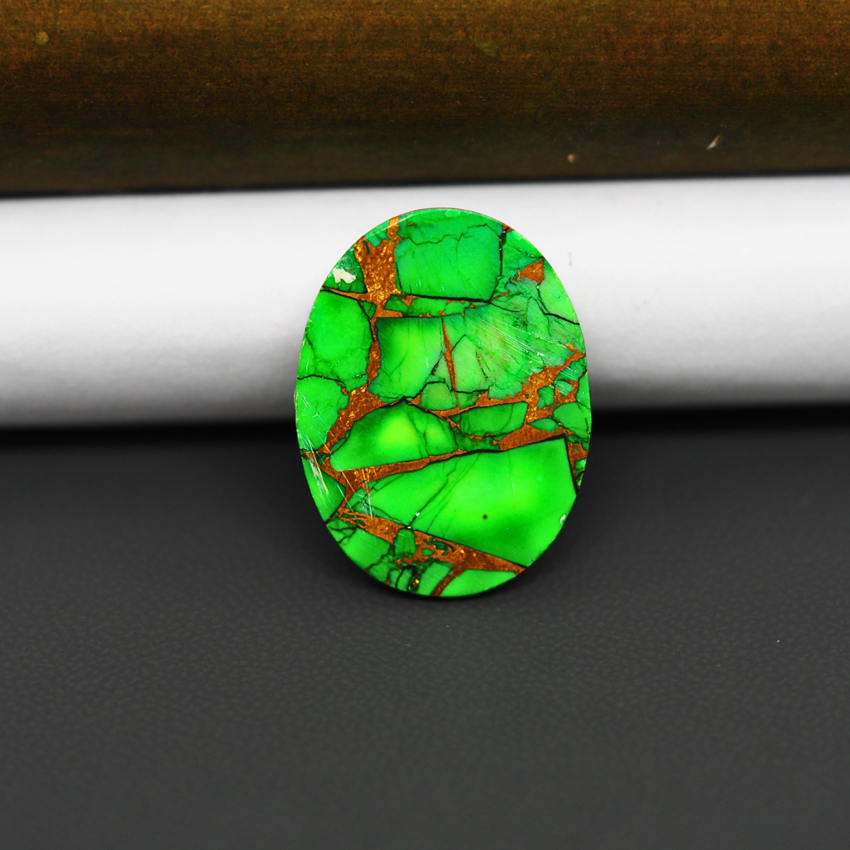 Natural Emerald Dahlia Oval Cabochon 25x18mm 18ct - vivid green with copper matrix, ships to Europe, Japan, Canada, Australia, NZ & worldwide - Pedra Gems.