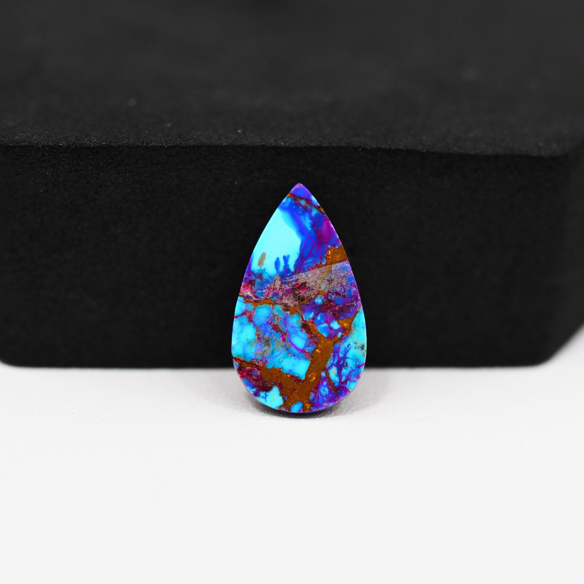 Stabilized Purple Mohave (Mojave) Turquoise Pear Cabochon 19x11x3mm 5.5ct - purple with blue Kingman turquoise nuggets and bronze veining - Pedra Gems.