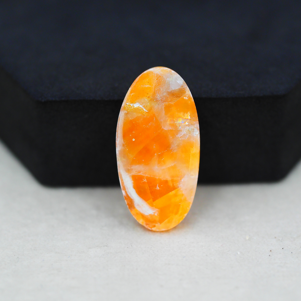 Natural Orange Calcite Oval Cabochon 29x15mm 20ct - warm honey-orange - Pedra Gems.